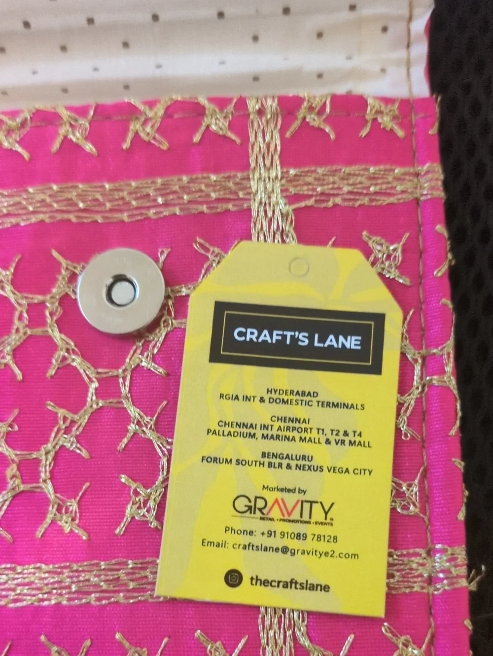 Pink Fabric Pouch with Traditional Gold Embroidered Pattern